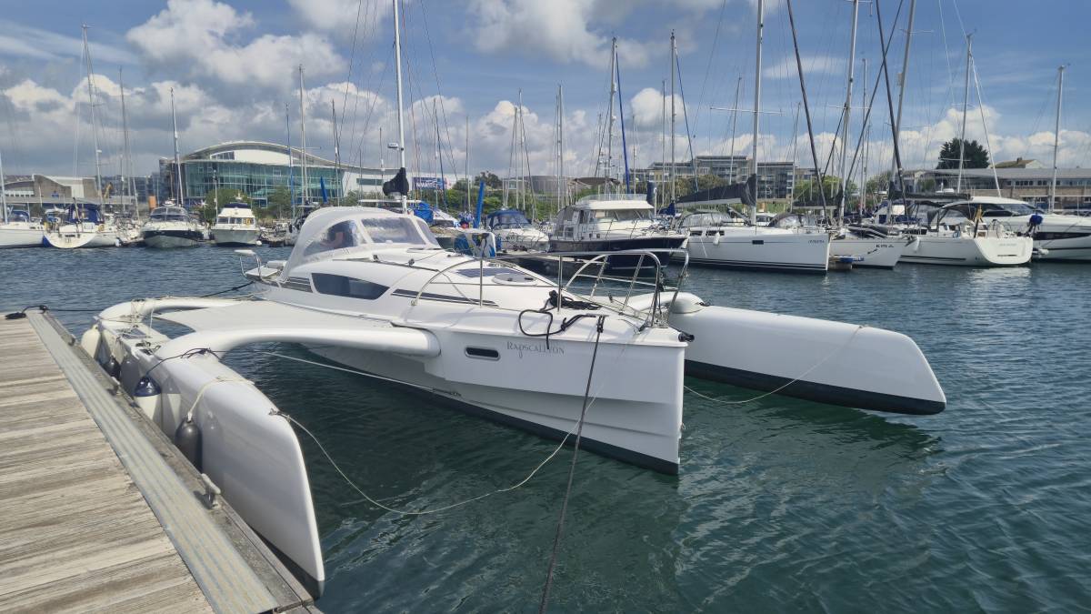 Freshwave Web and IT Rapscallyon Dragonfly Trimaran at Yacht Haven Pontoon